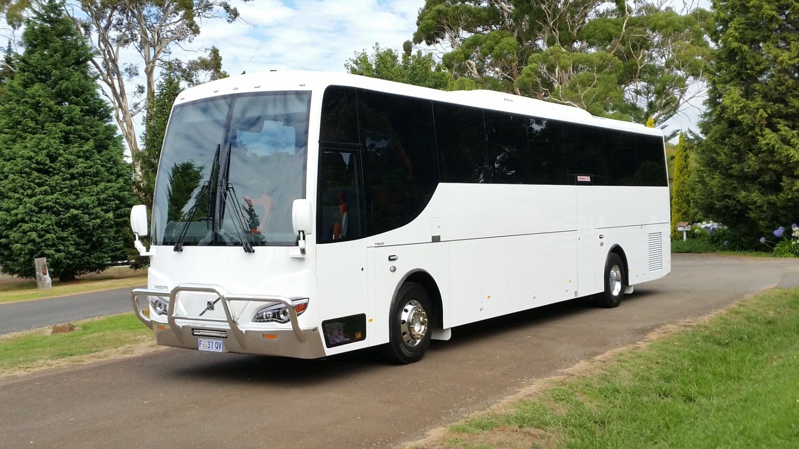 A McDermott's premium touring coach ready for departure